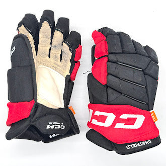 CCM HGJS - Gant NHL Pro Stock d'occasion - Jalen Chatfield (noir/rouge)